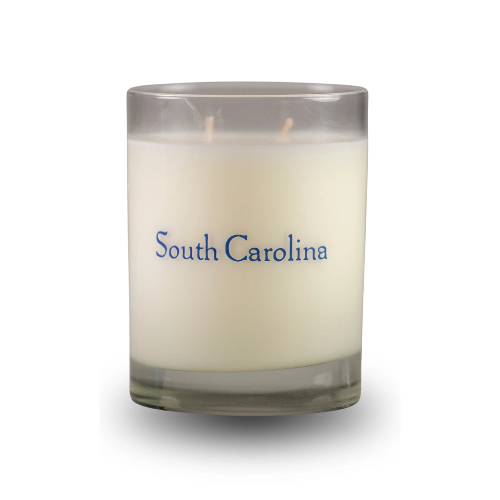 Candle in a glass jar with 'South Carolina' text on a white background