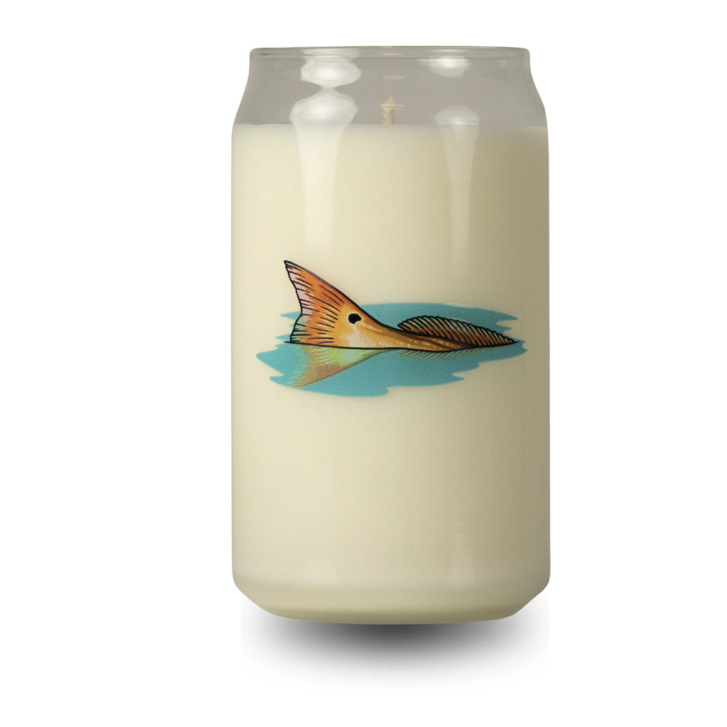 Candle in a can with a fish design on a white background