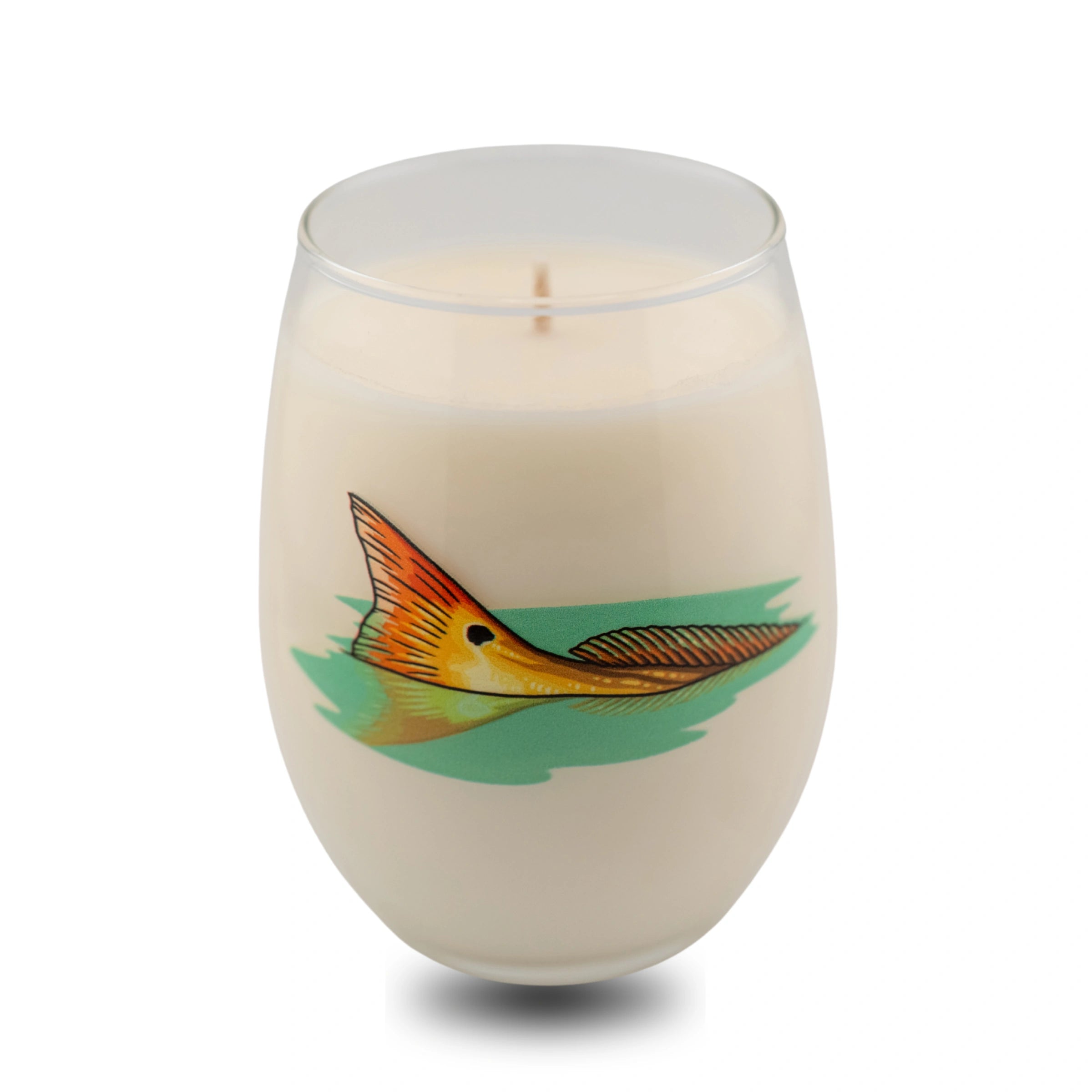 Candle in a glass container with a fish design on a white background