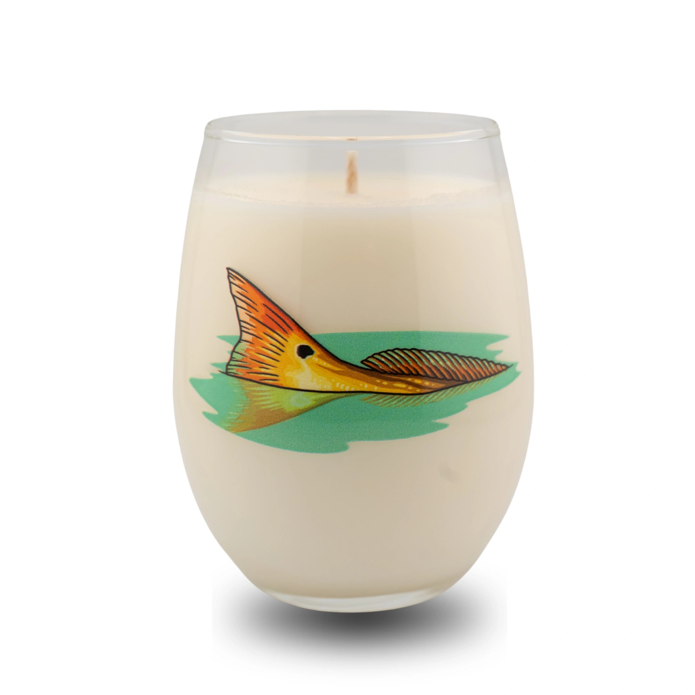 Candle in a glass container with a fish design on a white background
